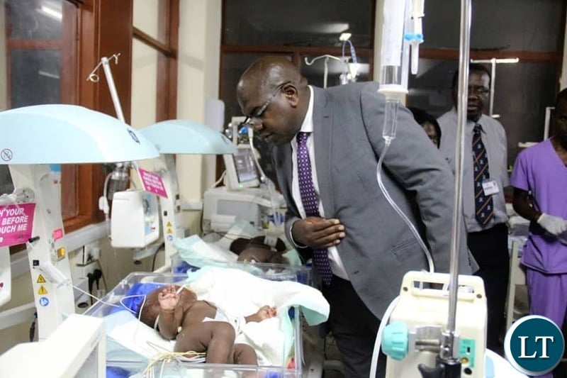 Minister of Health Dr. Chitalu Chilufya visiting the recovering twins