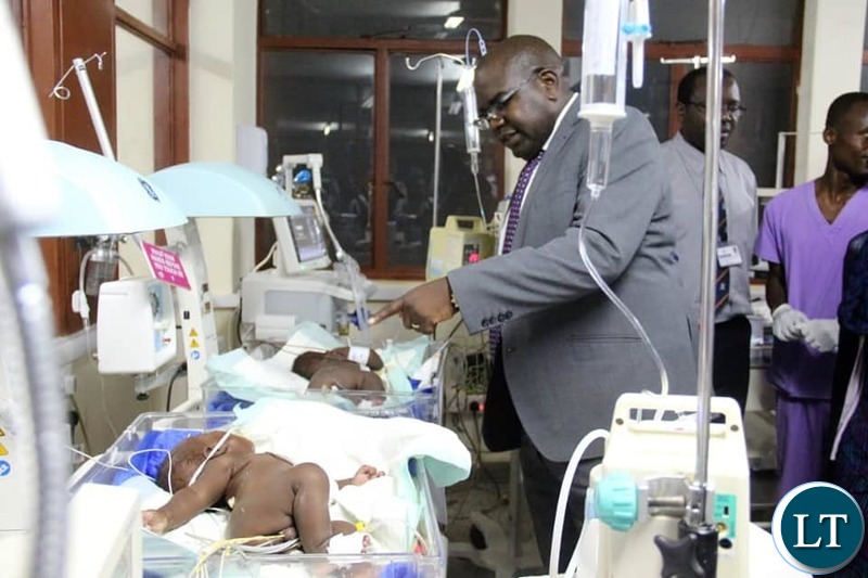 Minister of Health Dr. Chitalu Chilufya visiting the recovering twins