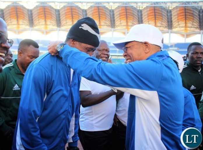 President Edgar Lungu on 2019 ICR 10 km race finishing line and being awarded a participation medal and congratulated by Madison Life board chairman Lawrence Sikuntwa and Madison Life CEO Agnes Chakonta at Lusaka National Heroes Stadium