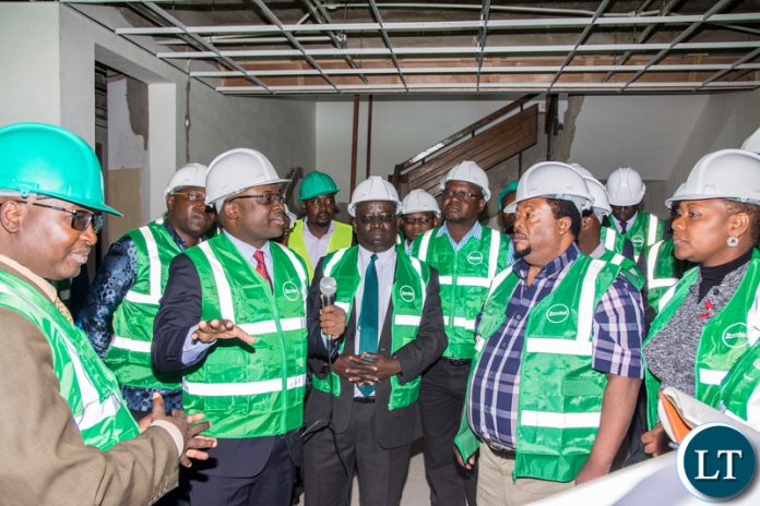 Zamtel CEO Mr Sydney Mupeta briefs Members of the Parliamentary Committee on Parastatals over the ongoing refurbishment of Lamya House during their tour of Zamtel facilities on Monday, June 3rd 2019. Zamtel CEO Mr Sydney Mupeta briefs Members of the Parliamentary Committee on Parastatals over the ongoing refurbishment of Lamya House during their tour of Zamtel facilities on Monday, June 3rd 2019.