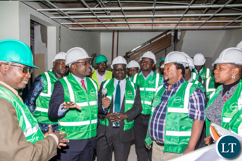 Zamtel CEO Mr Sydney Mupeta briefs Members of the Parliamentary Committee on Parastatals over the ongoing refurbishment of Lamya House during their tour of Zamtel facilities on Monday, June 3rd 2019.