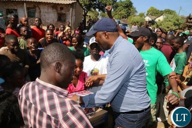Bowman Lusambo donates to  Pentecostal Holiness Church in Lusaka’s garden Township