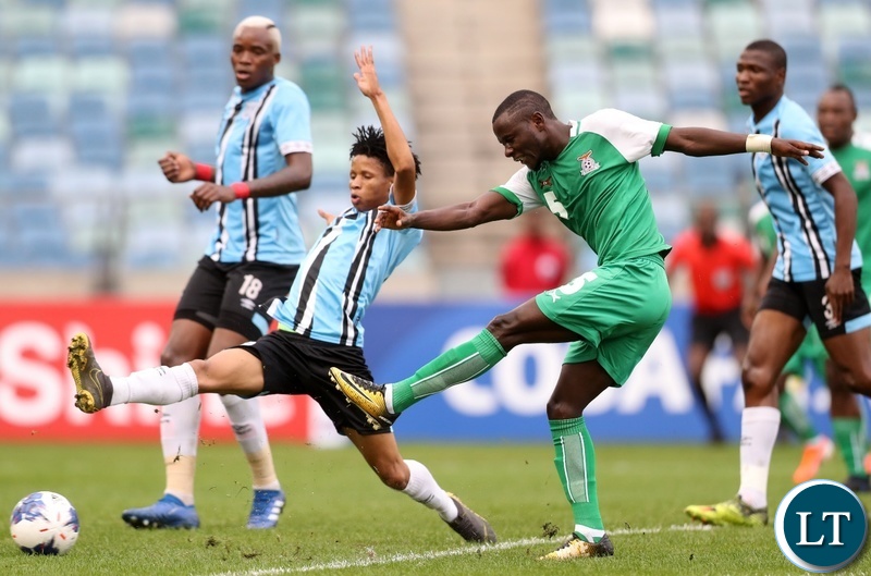 Austin Muwowo of Zambia challenged by Norman Mabaya of Botswana during the 2019 Cosafa Cup final match between Botswana and Zambia at Moses Mabhida Stadium, Durban on 08 June 2019 ©Samuel Shivambu/BackpagePix