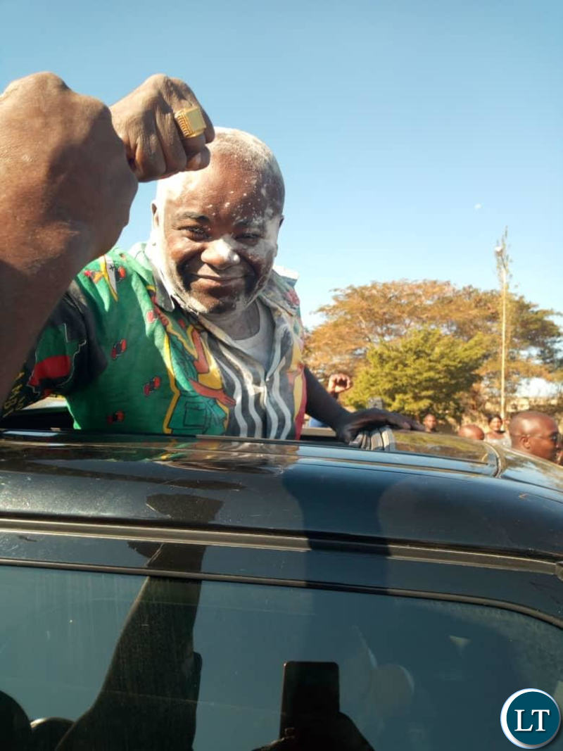 Mr Chitotela waves to his supporters after he was acquitted