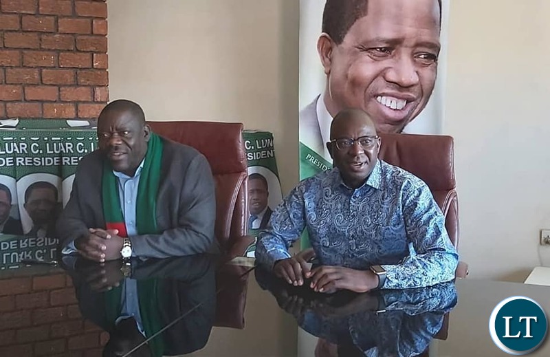 Patriotic Front Secretary General Davies Mwila welcoming UPND Member Bizwell Mutale.