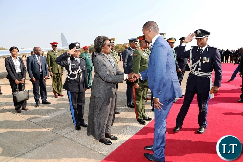 President Edgar Chagwa Lungu greets Vice-President Inonge Wina shortly before departure for Japan where he has gone to attend the 7th Tokyo International Conference on African Development (TICAD), at Zambia Airforce base in Lusaka on Monday, 26th August, 2019, Picture by Eddie Mwanaleza/State House.