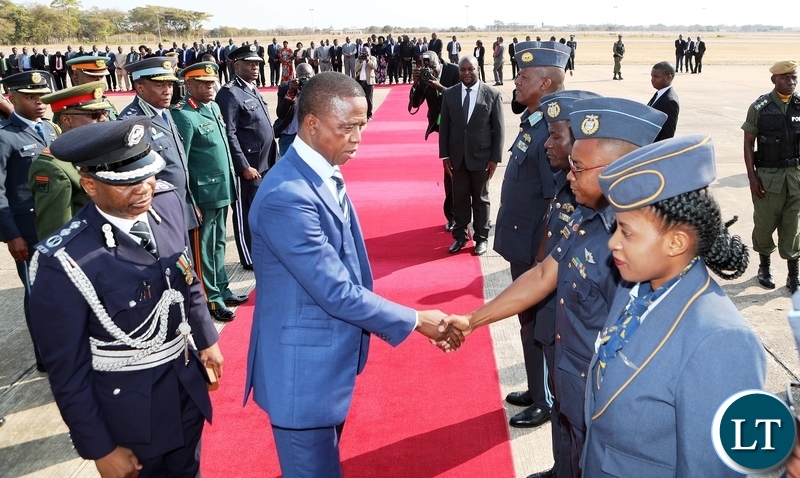 President Edgar Chagwa Lungu greets the Zambia Airforce crew shortly before departure for Japan where he has gone to attend the 7th Tokyo International Conference on African Development (TICAD), at Zambia Airforce base on Monday, 26th August, 2019, Picture by Eddie Mwanaleza/State House.