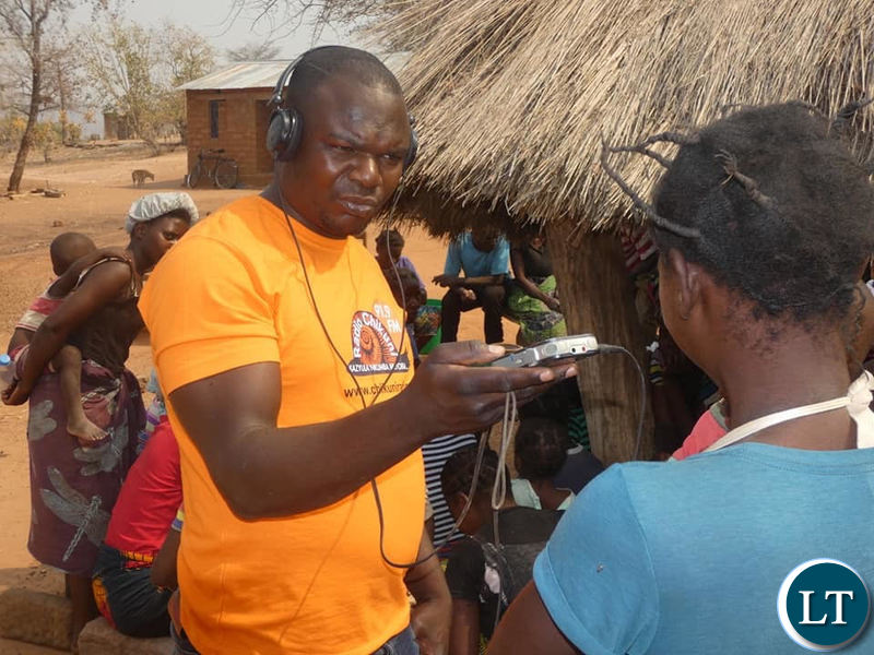 A Journalist from Chikuni Radio interviewing villagers in Pemba on the extent of the drought