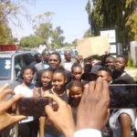 HH interacts with supporters after he featured on a radio programme on SUN FM