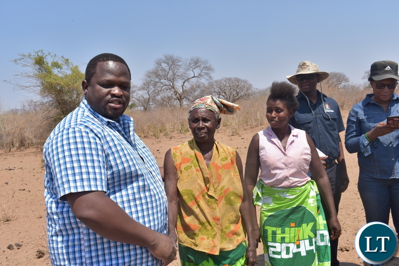 Minister Chiteme with beneficiaries of water project Kazungula