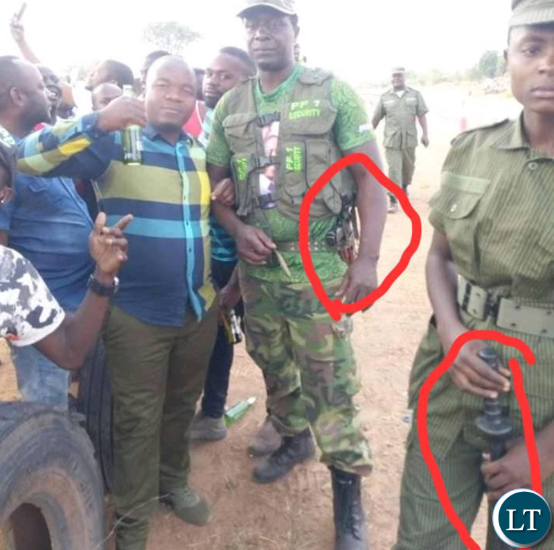 PF Cadres with Guns in a public place Guns