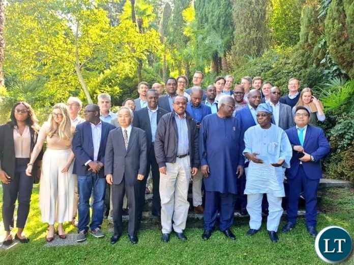 President Hakainde Hichilema in a group photo with other eminent and distinguished personalities attending a meeting organised by the Brenhurst Foundation at Lake Como, Italy to discuss Africa's economic trajectory under a theme, “Can Africa be the Next Asia?”