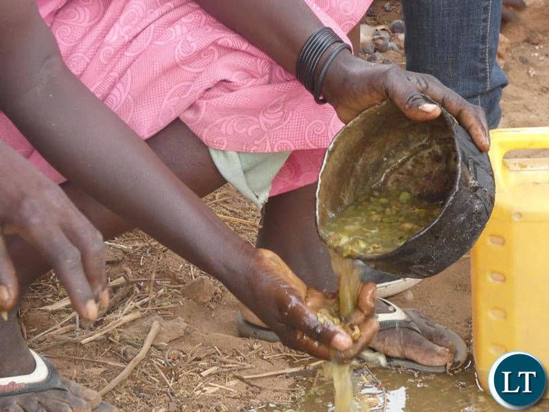 Villagers preparing Baobab fruits for a meal