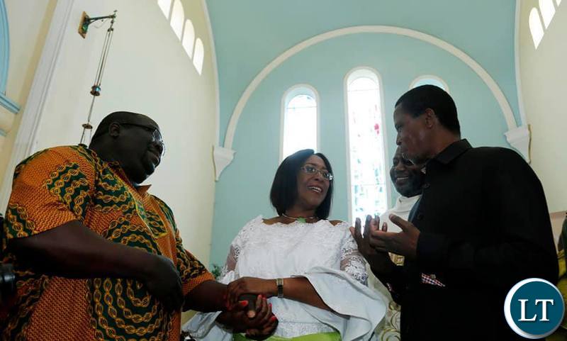 President Edgar Chagwa Lungu (right) extends his hands to Chishimba Kambwili (left)