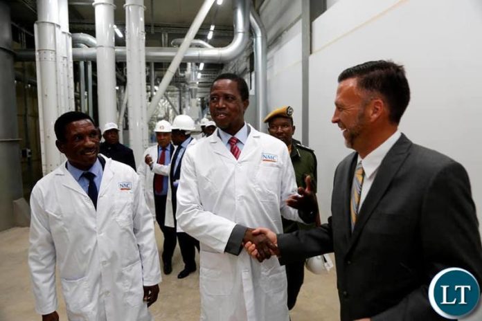 President Edgar Chagwa Lungu (centre) accompanied by Minister of Agriculture Michael Katambo (left) and National Milling Corporation Managing Director David Bosse tour the Ultra Modern New Mill in Lilayi, Lusaka on Friday, October 11,2019 .