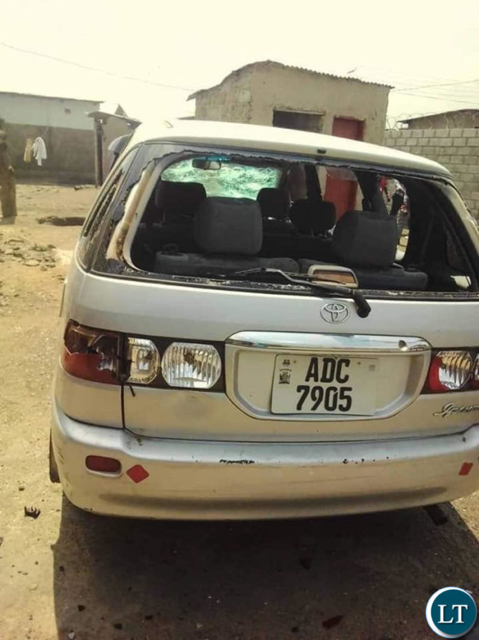 Vehicles damaged at the funeral home for late Lawrence Banda in Kanyama