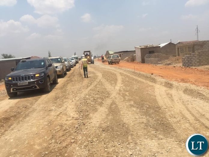 Dr. Chomba inspecting Road works in Lusaka