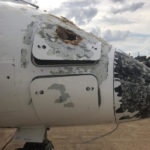 Bombardier Dash 8 Turbo prop aircraft after surviving the hailstorm