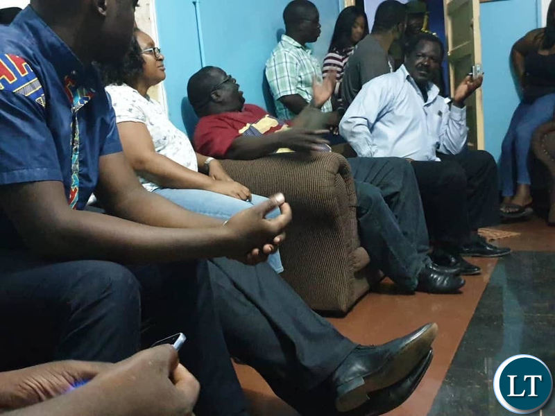 Chishimba Kambwili and NDC officials in the office of the Officer in Charge at Kitwe Central Police Station