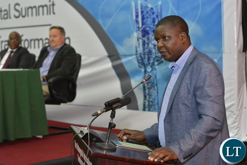 Yese Bwalya, Director Communications - Ministry of Transport and Communication, reads the speech on behalf of the Minister at the Zambia Digital Summit