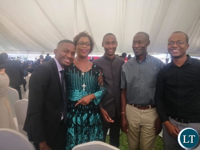 Deputy Secretary General of the Patriotic Front with her son Chifuka Phiri( To her left) at the Doctors Graduation Ceremony at University of Zambia Ridgeway campus