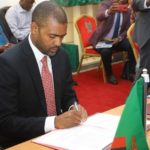 Housing and Infrastructure Development Minister Vincent Mwale with DRC Vice Premier and Minister of Infrastructure Sunzhel Ngoopos at the signing ceremony