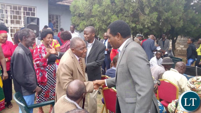 UPND leader Hakainde Hichilema greets ZSIC retirees who called on him at the party secretariat