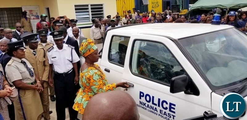 First Lady Esther Lungu Test Driving  the  $36,000 brand new Nissan Hard body 4×4 Motor Vehicle donated to  the modern Esther Lungu Police Post.