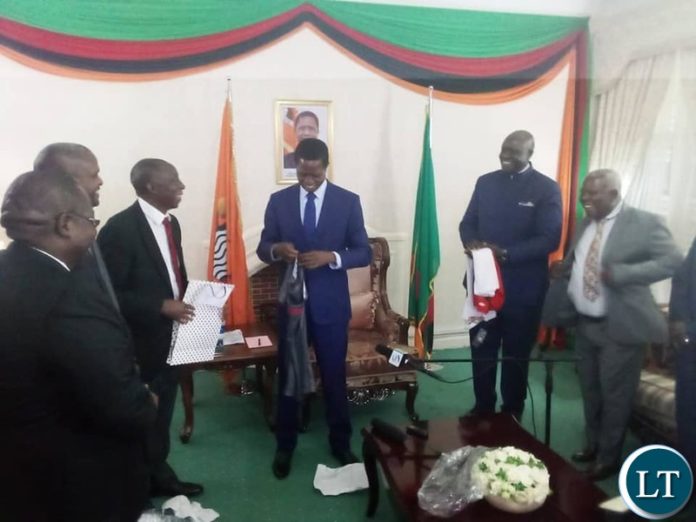 President Lungu receiving a ZANACO Jersey Replica