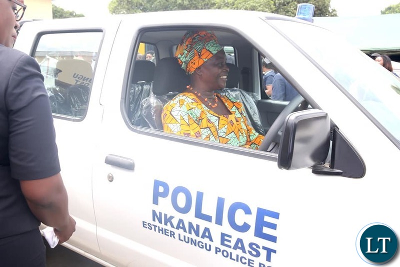 First Lady Esther Lungu Test Driving  the  $36,000 brand new Nissan Hard body 4×4 Motor Vehicle donated to  the modern Esther Lungu Police Post.