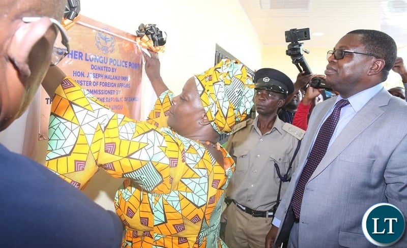First Lady Esther Lungu with Kitwe's Nkana East, the area member of Parliament for Kwacha Constituency Hon Joseph Malanji at the handover of a newly build Police Station