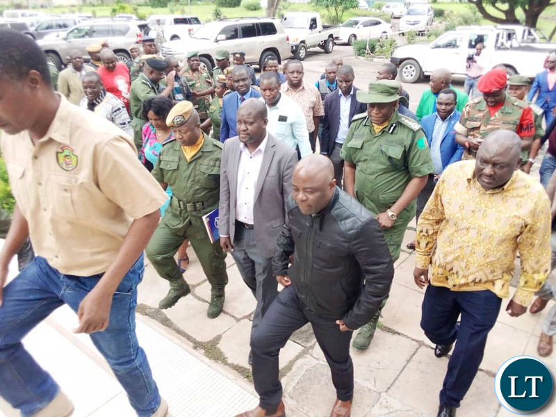 Defence Minister Davies Chama and Home Affairs Minister Stephen Kampyongo flanked by Police Inspector General Kakoma Kanganja arriving in Chingola on Sunday