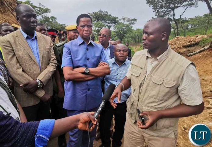 Mines Minister Richard Musukwa with President Lungu at a Potential Gold Mining Site in North Western Province Mines Minister Richard Musukwa with President Lungu at a Potential Gold Mining Site in North Western Province