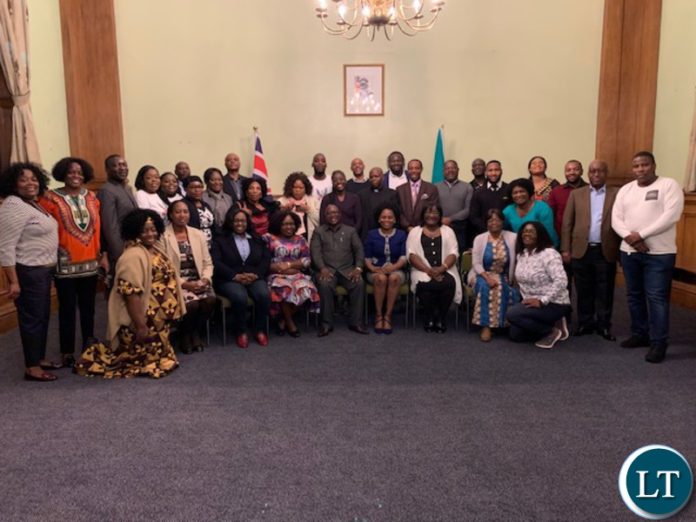 High Commissioner Mihova and Diplomats take a picture with Zambian Associations group Representatives at Zambia House.