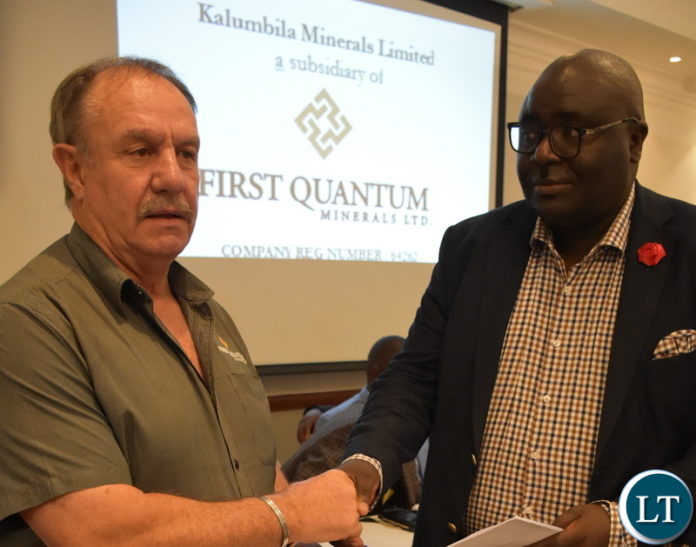 KALUMBILA Minerals Limited general manager Morris Rowe (left) shakes hands with National Union of Miners and Allied Workers (NUMAW) president James Chansa after the signing of the new conditions of service between the mine and three union representatives, the Mineworkers Union of Zambia (MUZ), United Miners’ Union of Zambia(UMUZ) and NUMAW at Southern Sun Hotel in Lusaka on Thursday. – Picture by Memory Chipili/SUMA SYSTEMS