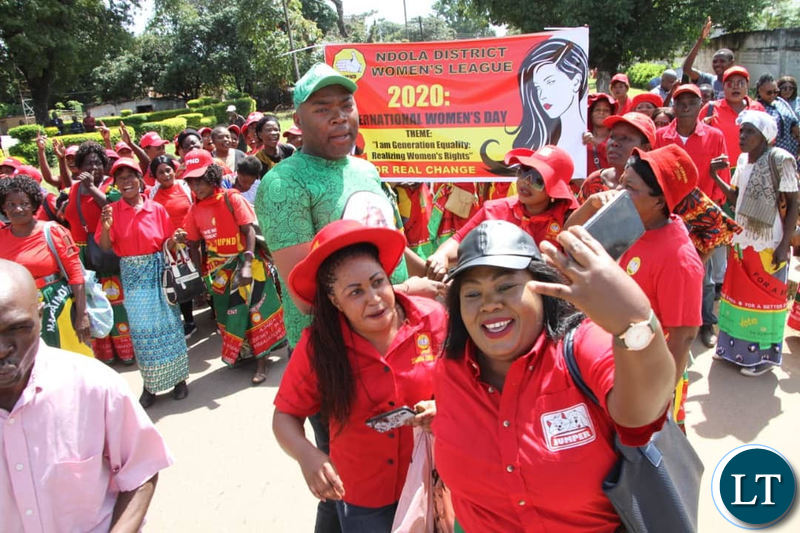 Lusaka Province Minister Bowman Lusambo greets UPND supporters during Women’s Day commemoration in Ndola