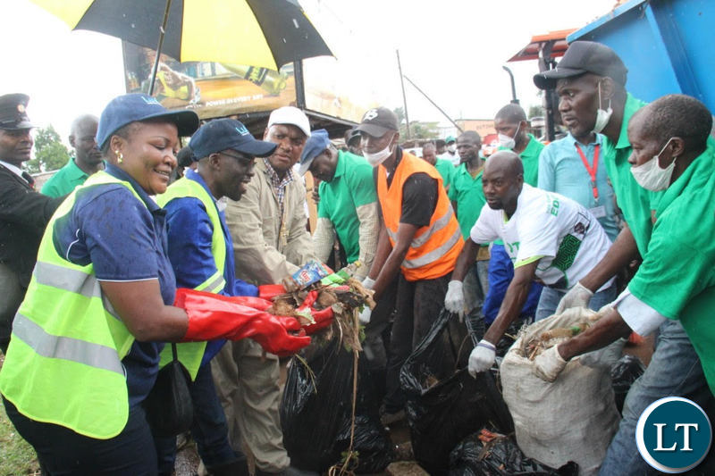 Mayor Sampa with Councillor Chitangala leading the cleaning exercise