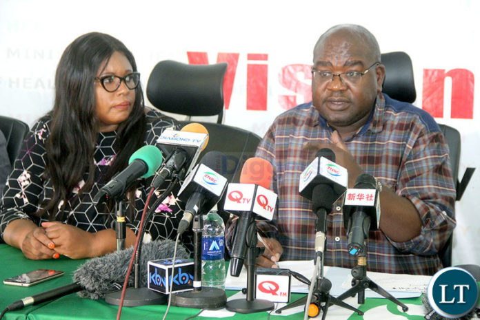 Health Minister Chitalu Chilufya flanked by Information and Broadcasting Service Minister Dora Siliya addresses journalists