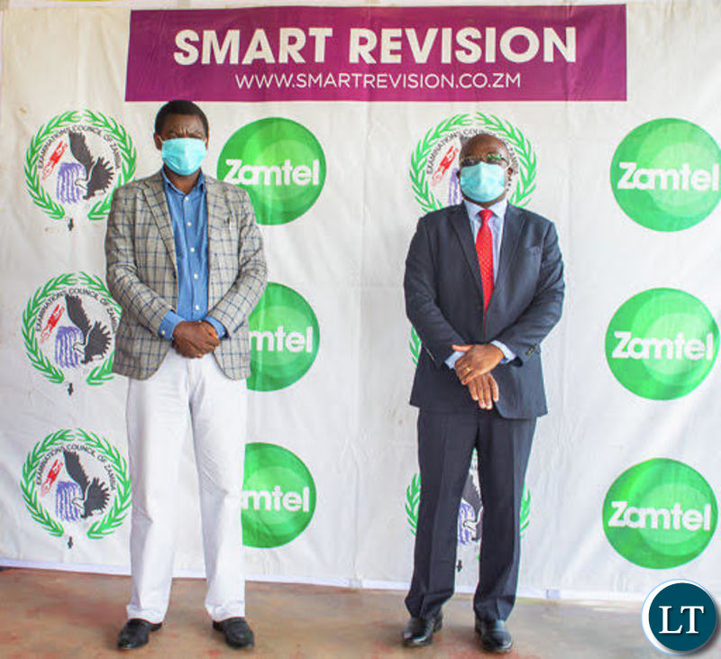 General Education Minister David Mabumba and ZAMTEL CEO Sydney Mupeta pose for a photo after the launch of the e-Learning and Smart Revision portals in Kasama