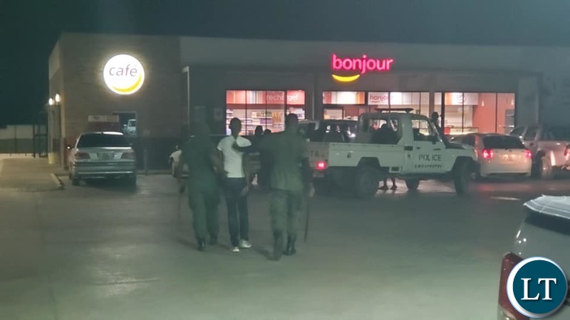 Police whip and picked up patrons found consuming alcohol at total filling station in Salama Park