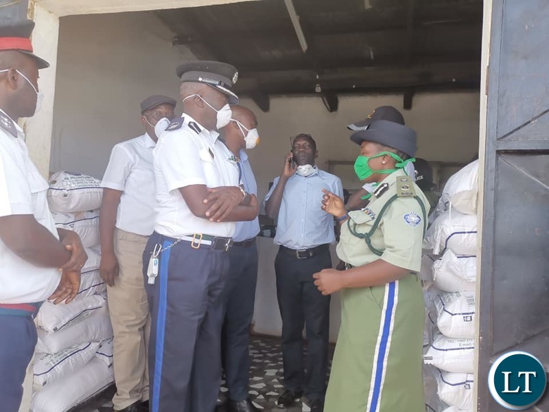 Copperbelt Minister Mr Mwakalombe flanked by Copperbelt Police Commsioner Charity Katanga, NCC Town clerk Wisdom Bwalya , District Commsioner Anthony Katongo and other officials