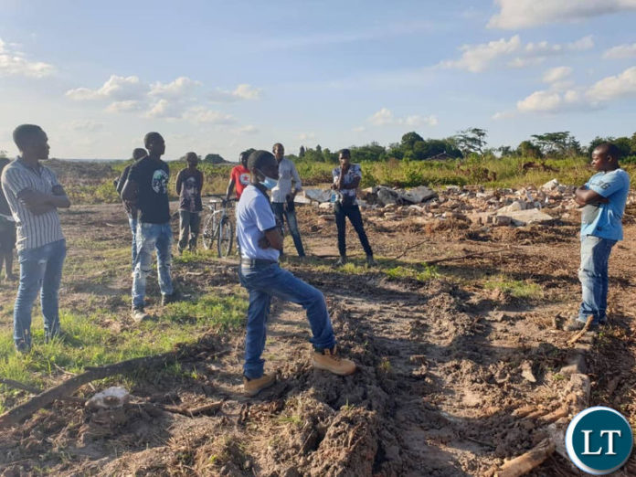 Luanshya Mayor Nathan Chanda with officials from the Council visiting the site where Luanshya Mine has started constructing a new open pit mine near Roan Sports Field. Luanshya Mayor Nathan Chanda with officials from the Council visiting the site where Luanshya Mine has started constructing a new open pit mine near Roan Sports Field.