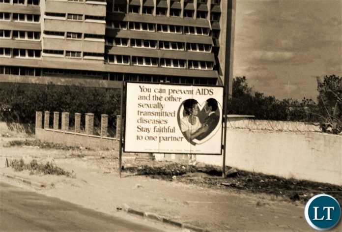AIDS Black and White – A sign about HIV/AIDS prevention on the Great North near the North-End of Cairo Road in Lusaka in 1993. AIDS Black and White – A sign about HIV/AIDS prevention on the Great North near the North-End of Cairo Road in Lusaka in 1993.