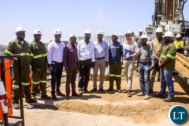 Dr Banda standing next to Energy Minister Mathew Nkuwa fifth and sixth from left