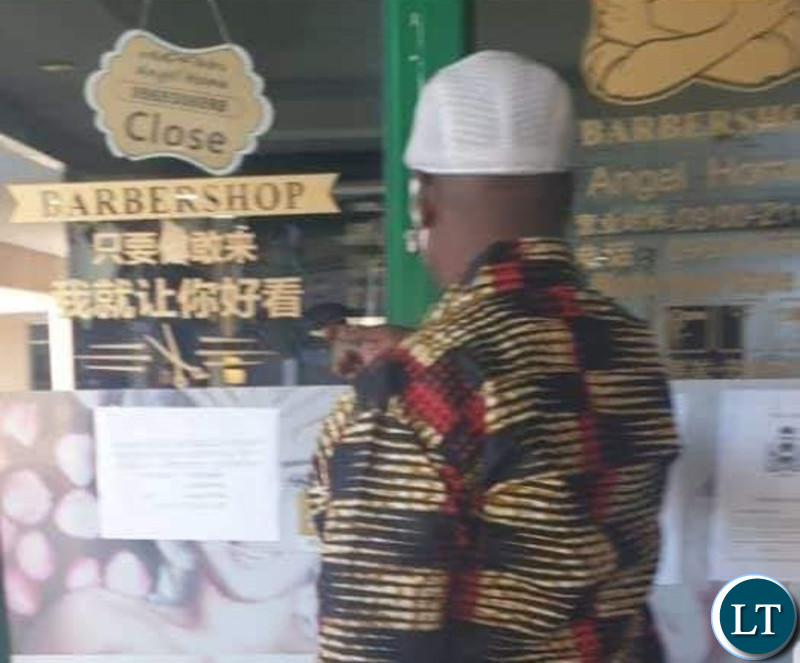 Miles Sampa at the Chinese owned Angels Barbershop at Arcades Shopping Mall