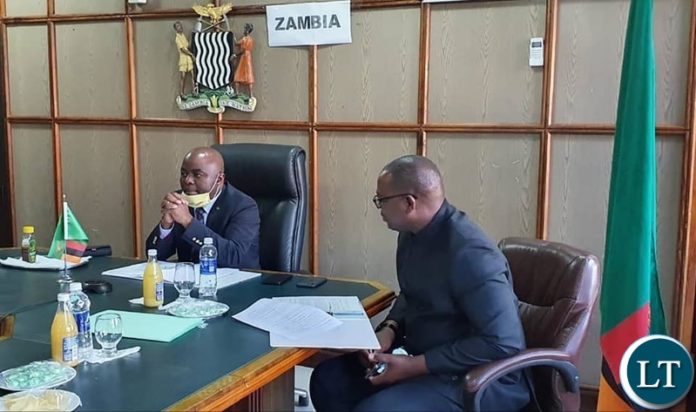 Home Affair Minister Stephen Kampyongo in an ONLINE SADC Meeting together with Minister of Transport and Communications Hon. Mutotwe Kafwaya M.P., Minister of Commerce, Trade and Industry Hon. Christopher Yaluma, M.P., Ministry of Foreign Affairs Permanent Secretary International Relations and Cooperation Ambassador Chalwe Lombe, Ministry of Finance Permanent Secretary Budget and Economic Affairs Dr. Emmanuel Pamu, Ministry of Health Permanent Secretary Technical Services Dr. Kennedy Malama, Ministry of Commerce Trade and Industry Permanent Secretary Mr. Mushuma Mulenga, and other senior Government officials. Home Affair Minister Stephen Kampyongo in an ONLINE SADC Meeting together with Minister of Transport and Communications Hon. Mutotwe Kafwaya M.P., Minister of Commerce, Trade and Industry Hon. Christopher Yaluma, M.P., Ministry of Foreign Affairs Permanent Secretary International Relations and Cooperation Ambassador Chalwe Lombe, Ministry of Finance Permanent Secretary Budget and Economic Affairs Dr. Emmanuel Pamu, Ministry of Health Permanent Secretary Technical Services Dr. Kennedy Malama, Ministry of Commerce Trade and Industry Permanent Secretary Mr. Mushuma Mulenga, and other senior Government officials.