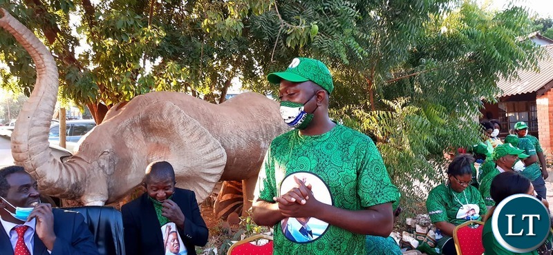 Patriotic Front Lusaka Province Youth Chairperson Danniel Kalembe making a speech during the donation of materials to fight COVID-19