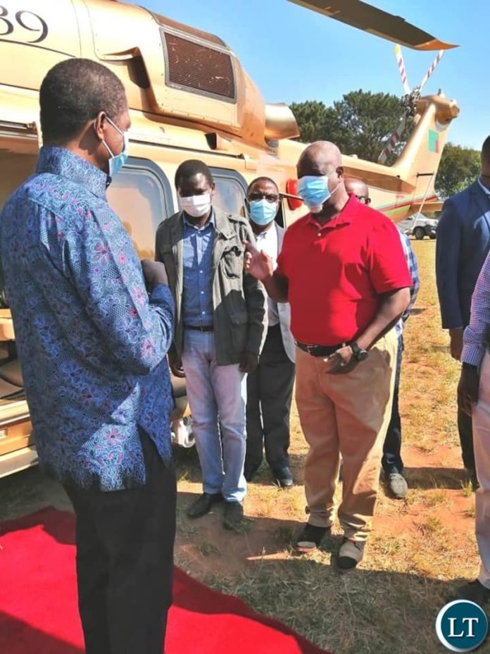 President Edgar LUNGU conversating with UPND Ikelenge Member of Parliament Hon Elijah Muchima upon arrival at Ikelenge Secondary School President Edgar LUNGU conversating with UPND Ikelenge Member of Parliament Hon Elijah Muchima upon arrival at Ikelenge Secondary School
