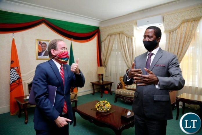 US Embassy Chargé d’ Affaires David Young with President Lungu at State House