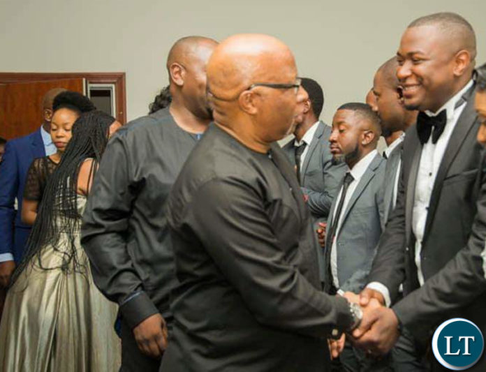 Nevers Mumba shaking hands with the new Deputy S.G Gregory Mofu